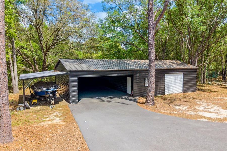 Exterior details and patio area of a home in , Fort White (Image 25).