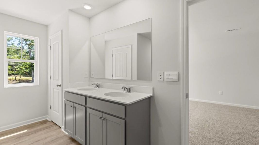 Furnished interior view inside a new home in Falcon Landing Townhomes, Gainesville (Image 9). Furnished interior view inside a new home in Falcon Landing Townhomes, Gainesville (Image 9).