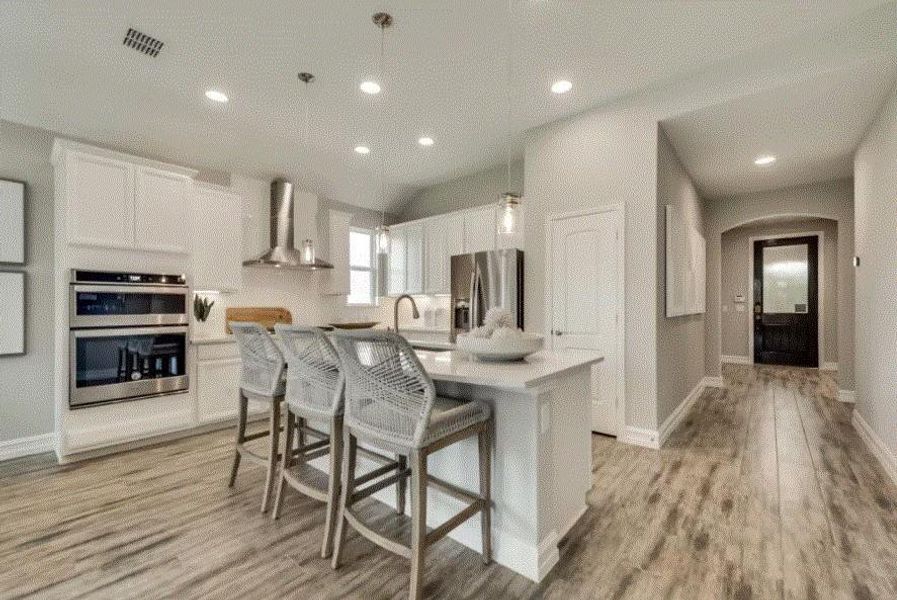 Photo of Pulte model home with same floor plan, not of actual home listed.