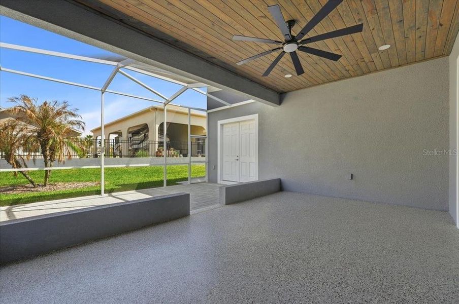 Exterior details and patio area of a home in , Polk City (Image 29).