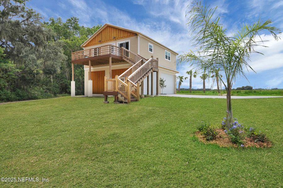 Front exterior of a new home in , East Palatka, FL, highlighting curb appeal (Image 48). Front exterior of a new home in , East Palatka, FL, highlighting curb appeal (Image 48).