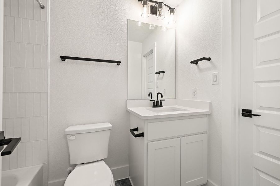 Furnished interior view inside a new home in Blackhawk in Pflugerville, Pflugerville (Image 12).