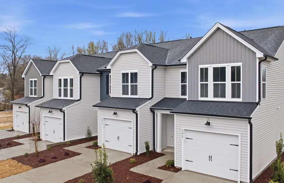 Front exterior of a new home in Flemingfield, Greensboro, NC, highlighting curb appeal (Image 28).