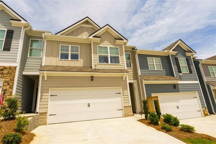 Front exterior of a new home in Rolling Meadows, Jasper, GA, highlighting curb appeal (Image 25).