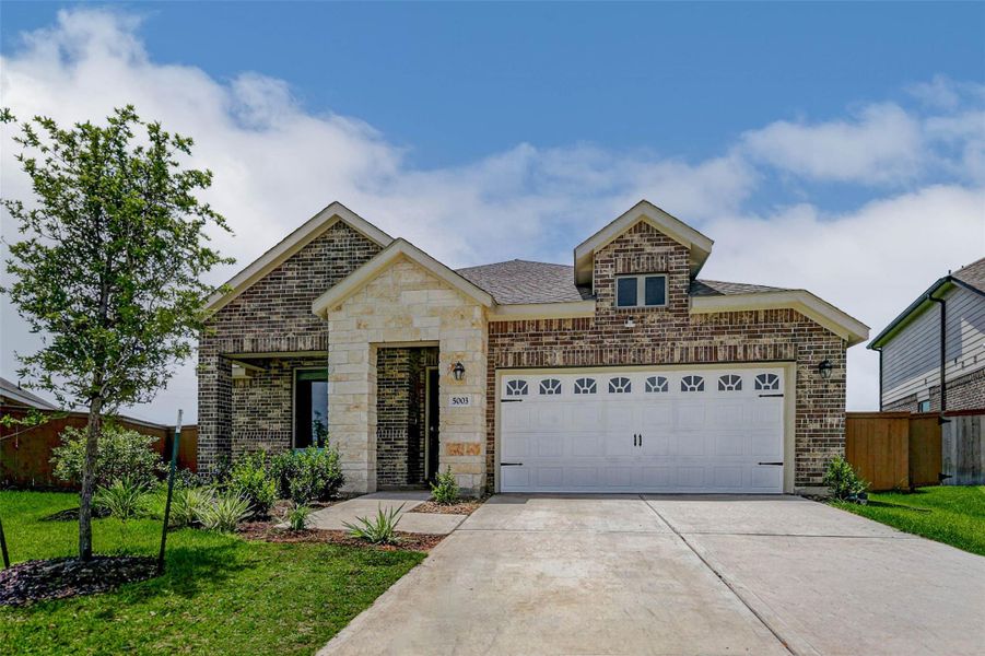 Stunning stone & brick elevation in Sunterra! This Katy TX home features modern curb appeal, a 2-car garage, and easy access to Katy ISD schools, shopping, and the lazy river. Welcome to 5003 Winslow Grove! Stunning stone & brick elevation in Sunterra! This Katy TX home features modern curb appeal, a 2-car garage, and easy access to Katy ISD schools, shopping, and the lazy river. Welcome to 5003 Winslow Grove!
