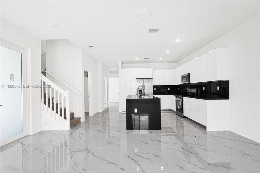 Furnished interior view inside a new home in , Miami (Image 8).