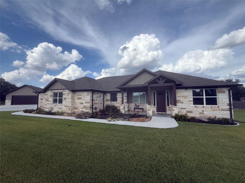 Front exterior of a new home in , Cuero, TX, highlighting curb appeal (Image 21).
