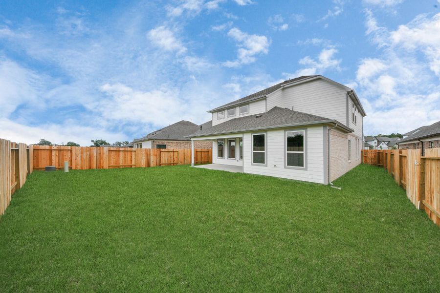 Explore the expansive backyard with its inviting covered patio—a perfect blend of space for the kids to play and adults to unwind. Ideal for creating your outdoor oasis, this backyard accommodates patio furniture, a BBQ pit, and endless possibilities for leisure and entertainment. Explore the expansive backyard with its inviting covered patio—a perfect blend of space for the kids to play and adults to unwind. Ideal for creating your outdoor oasis, this backyard accommodates patio furniture, a BBQ pit, and endless possibilities for leisure and entertainment.