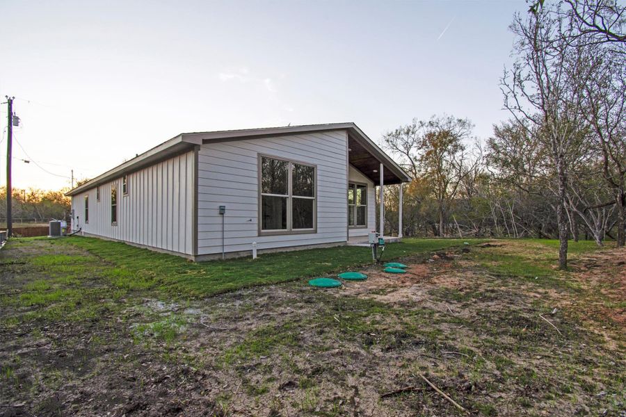 Exterior details and patio area of a home in , Bastrop (Image 26).