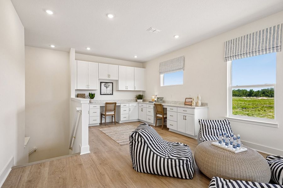 Furnished interior view inside a new home in Northlake at Ovation, Winter Garden (Image 37).