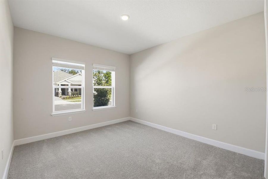 Spacious, unfurnished interior of a new home in Harvest at Ovation, Winter Garden (Image 21).