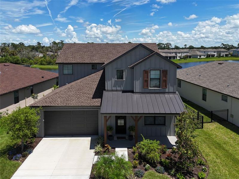 Front exterior of a new home in , Parrish, FL, highlighting curb appeal (Image 23).