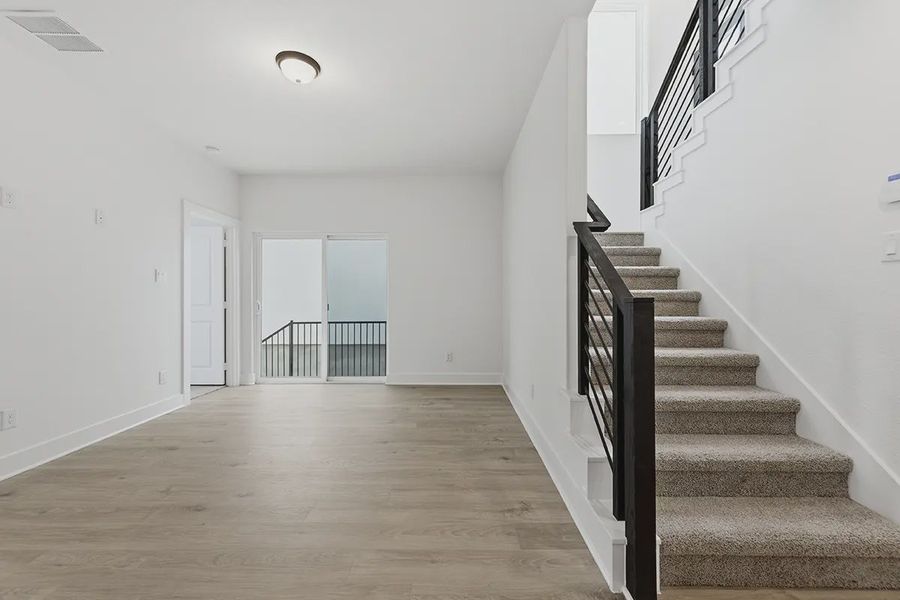 Spacious, unfurnished interior of a new home in Centero at Stone Oak, San Antonio (Image 18).
