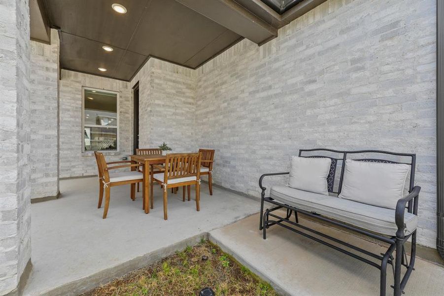 Exterior details and patio area of a home in Pecan Square, Northlake (Image 3). Exterior details and patio area of a home in Pecan Square, Northlake (Image 3).