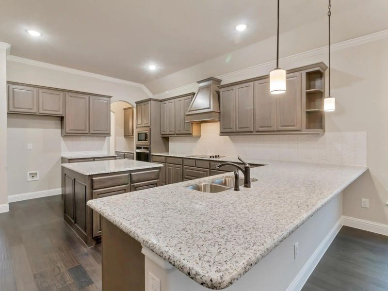 Kitchen | Concept 2533 at Abe's Landing in Granbury, TX by Landsea Homes