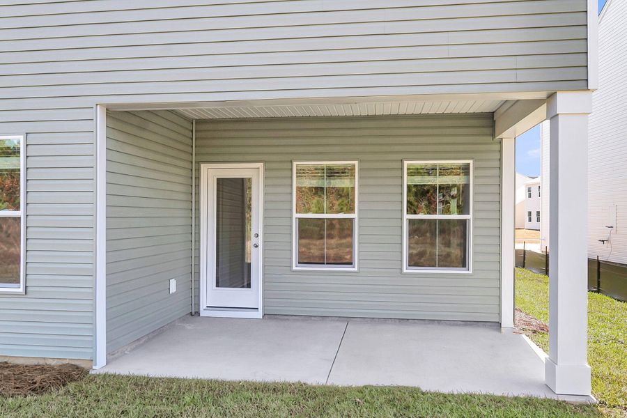 Exterior details and patio area of a home in Wildcat Chase, Summerville (Image 14).