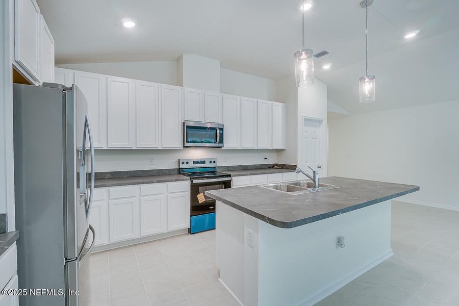 Furnished interior view inside a new home in Anabelle Island - Classic Series, Green Cove Springs (Image 5).