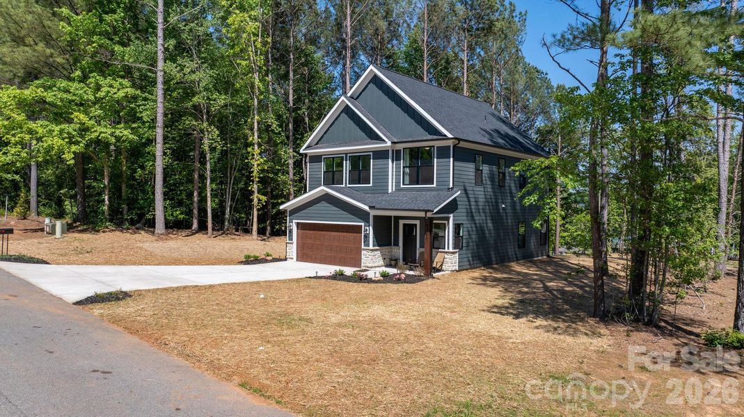 Front exterior of a new home in , Hickory, NC, highlighting curb appeal (Image 30).