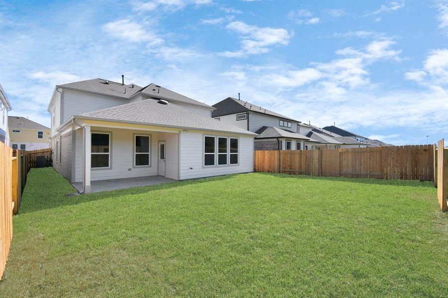 Backyard retreat, offering an abundance of space for kids to play and explore. The possibilities are endless in this outdoor haven, where the joy of open-air activities and family gatherings awaits.