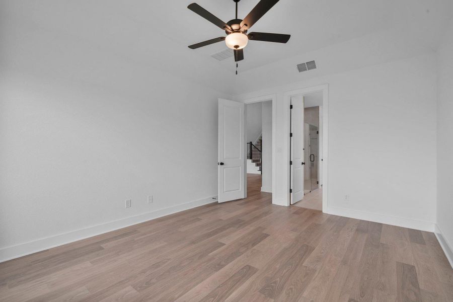 Primary Bedroom with elevated ceiling