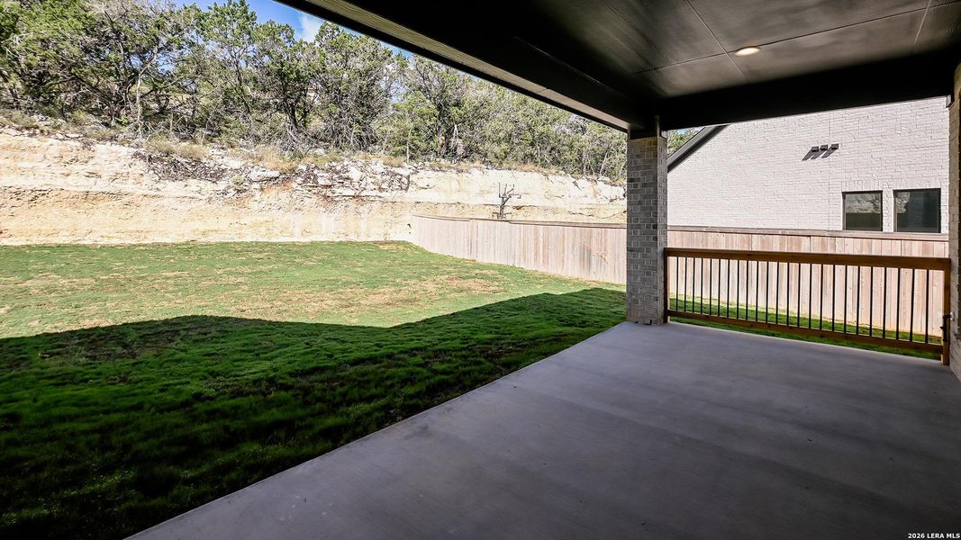 Exterior details and patio area of a home in Hidden Canyon, San Antonio (Image 22).