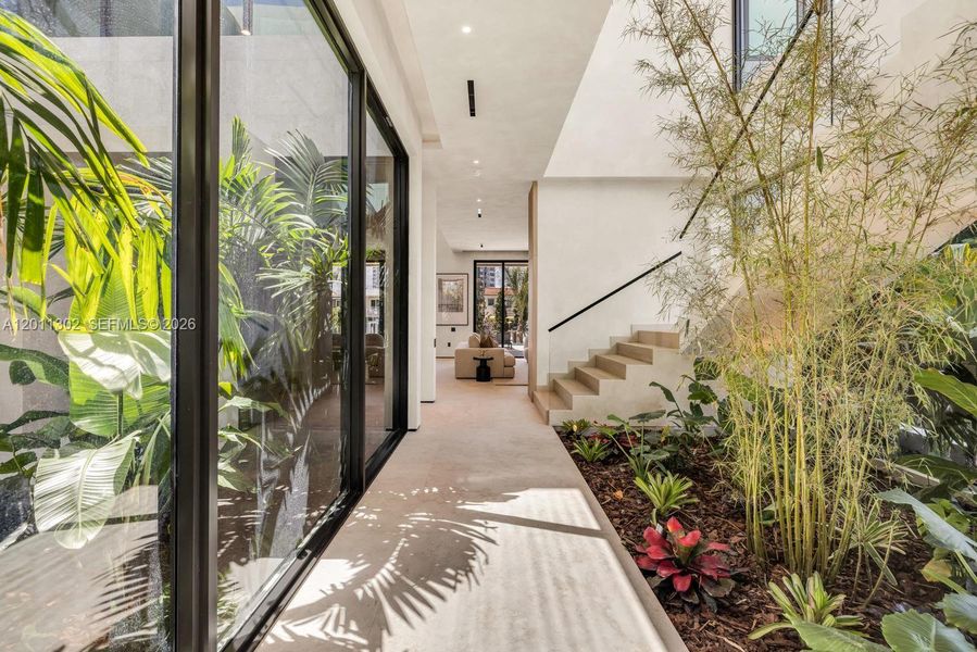 Exterior details and patio area of a home in , North Miami (Image 36).