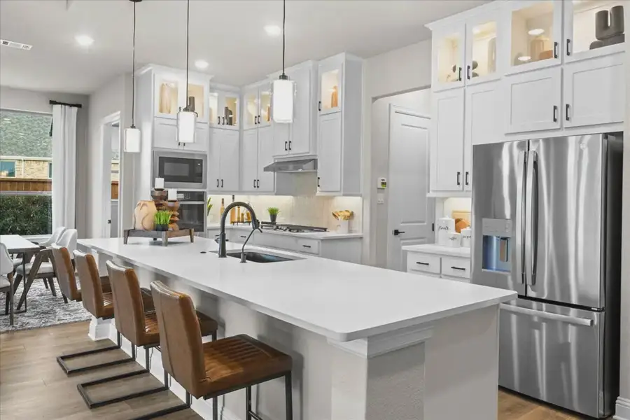 Representative furnished interior of a home built from the Brookville by Chesmar Homes in Canyon Falls, Argyle (Image 3).