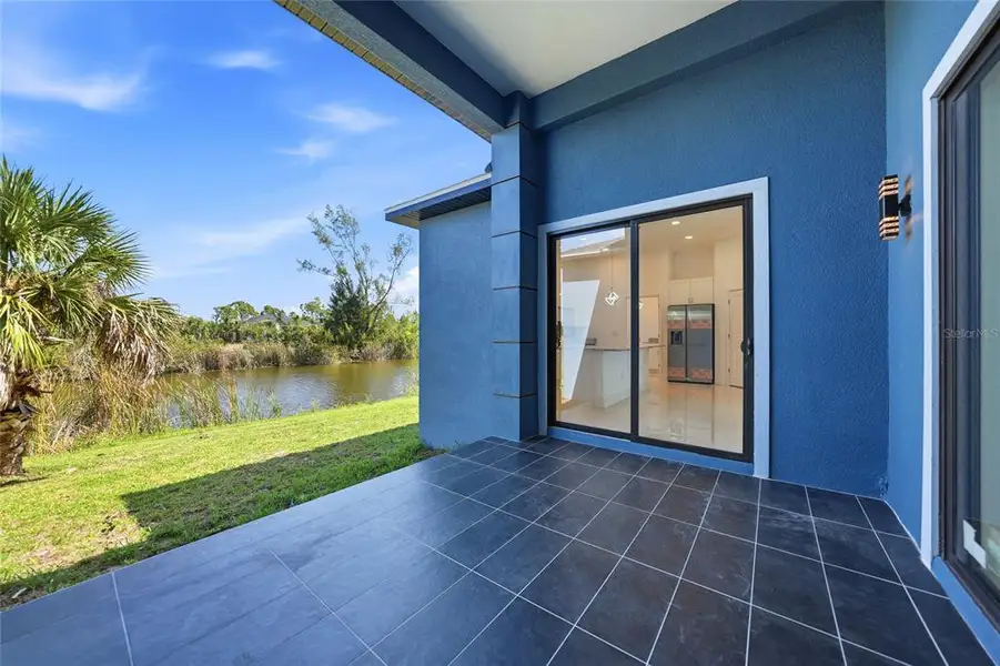 Exterior details and patio area of a home in , Port Charlotte (Image 26).