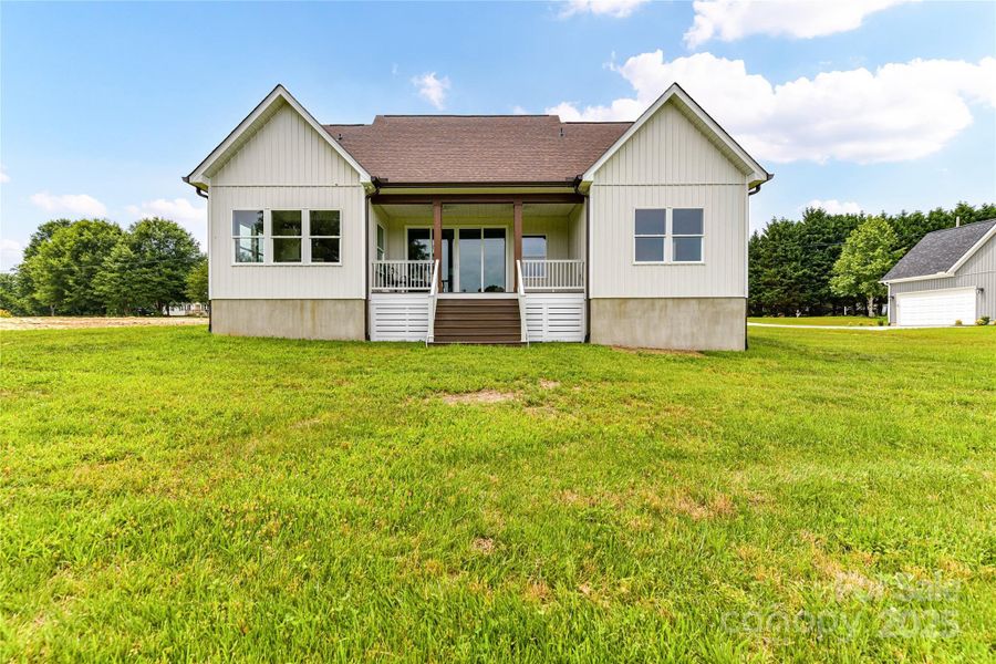 Exterior Back of Home with Large, Covered Deck! Exterior Back of Home with Large, Covered Deck!