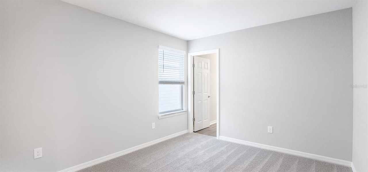 Spacious, unfurnished interior of a new home in The Crossings - Bungalows, St. Cloud (Image 16).