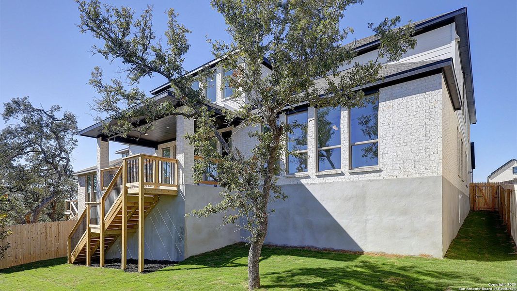 Exterior details and patio area of a home in Ranches At Creekside 55', Boerne (Image 4).