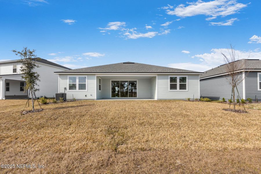 Exterior details and patio area of a home in Lakes at Bella Lago, Green Cove Springs (Image 2).