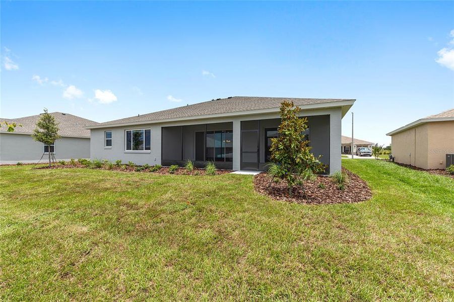 Exterior details and patio area of a home in On Top of the World Communities, Ocala (Image 3).