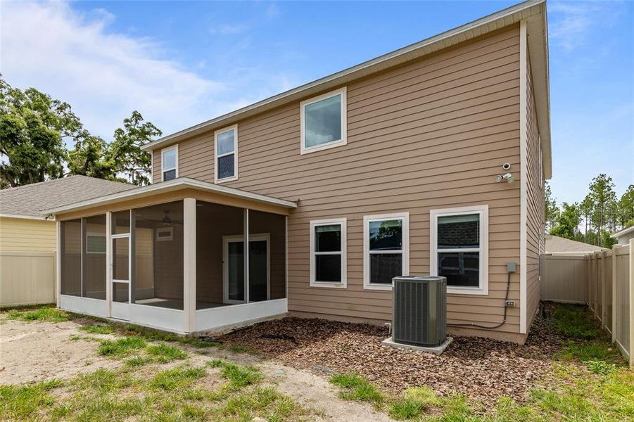 Exterior details and patio area of a home in Avalon Woods, Newberry (Image 24).