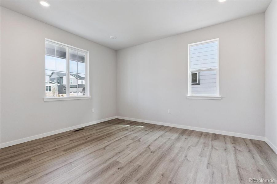 Spacious, unfurnished interior of a new home in Floret Collection at Parkdale Commons, Lafayette (Image 11).