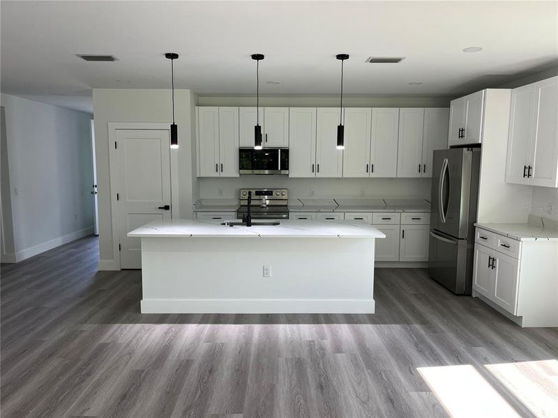 Furnished interior view inside a new home in , Kissimmee (Image 8).