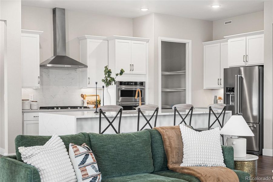 Furnished interior view inside a new home in Hilltop at Inspiration, Aurora (Image 7).