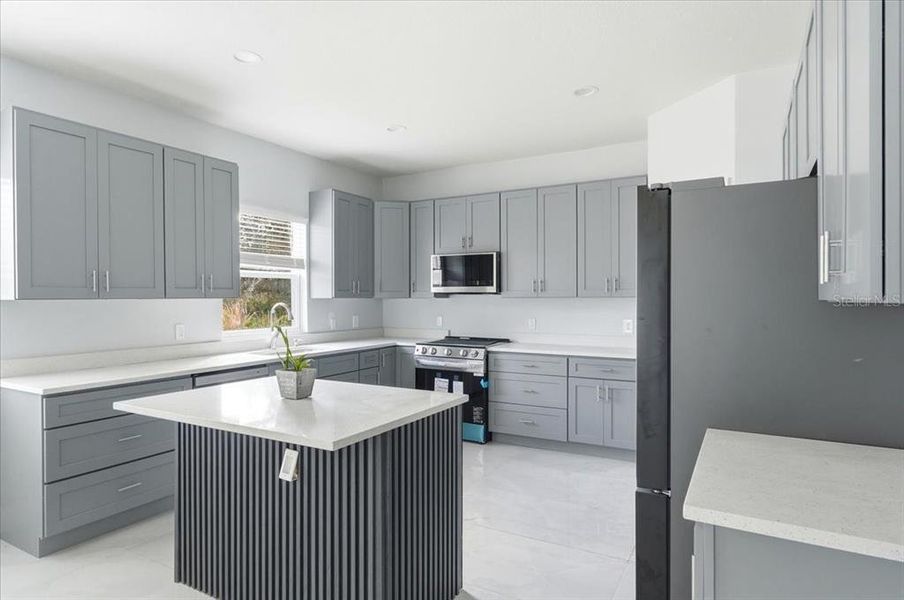 Furnished interior view inside a new home in , Indian Lake Estates (Image 6).