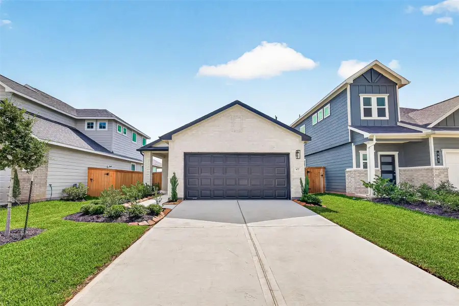 Front exterior of a new home in La Segarra, Brookshire, TX, highlighting curb appeal (Image 1). Front exterior of a new home in La Segarra, Brookshire, TX, highlighting curb appeal (Image 1).
