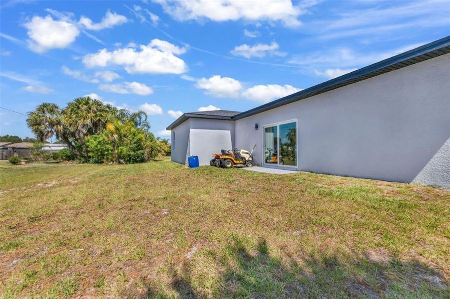 Exterior details and patio area of a home in , Port Charlotte (Image 25).