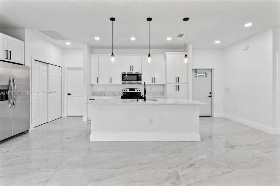 Furnished interior view inside a new home in , Lehigh Acres (Image 5). Furnished interior view inside a new home in , Lehigh Acres (Image 5).