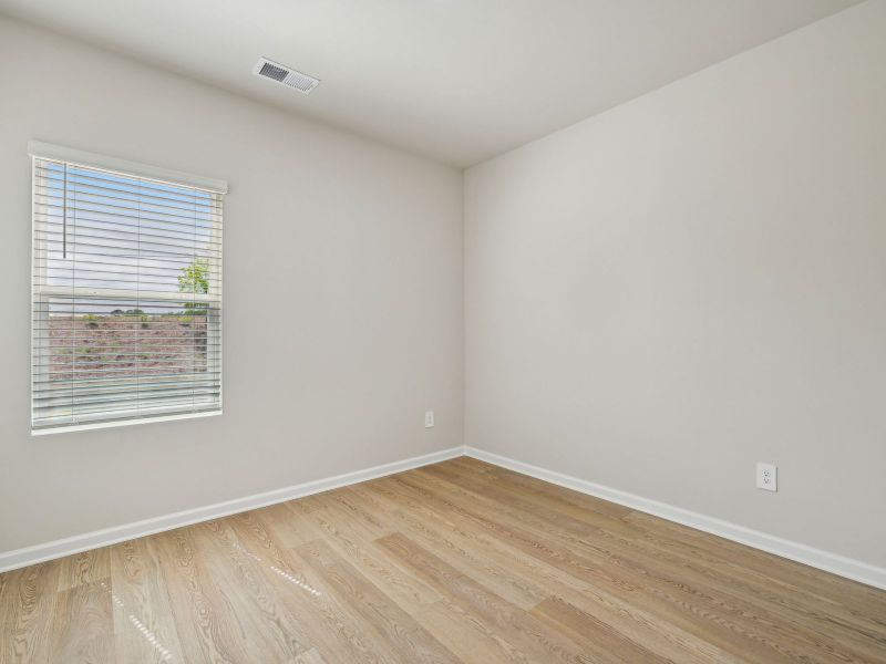 Spacious, unfurnished interior of a new home in River Glen, Angier (Image 15).