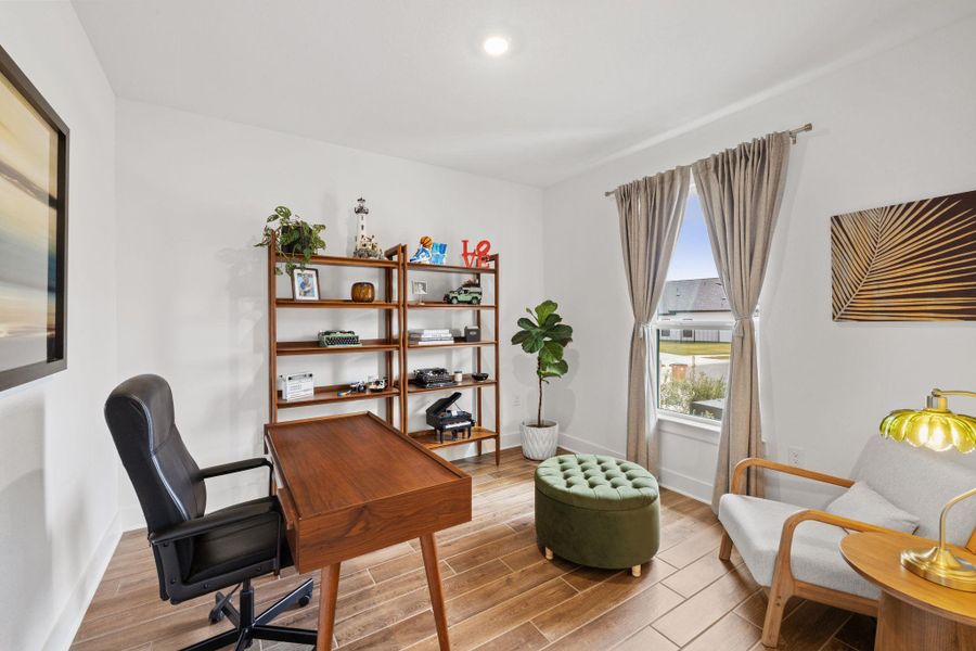 Office area featuring tiled floors and recessed lighting