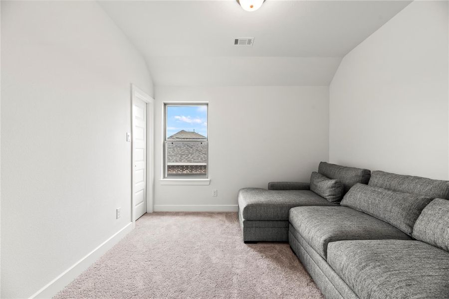 This impressive floor plan features three spacious guest rooms upstairs, each with neutral paint, plush carpet, a large closet and easy access to a full bathroom.