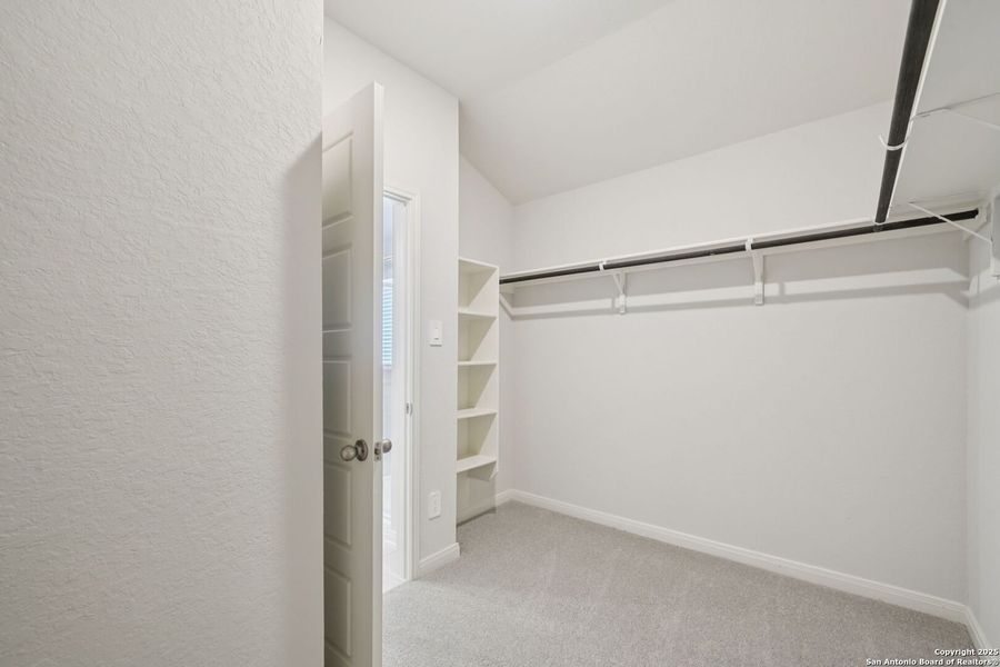 Spacious, unfurnished interior of a new home in Estancia Ranch - Premier Series, San Antonio (Image 24).