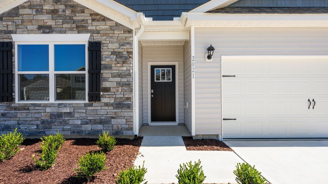 Front exterior of a new home in West New Bern, New Bern, NC, highlighting curb appeal (Image 21).