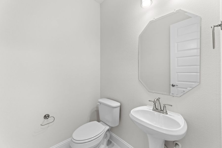 Representative furnished interior of a home built from the Willow by UnionMain Homes in Edgewater, Fate (Image 6).