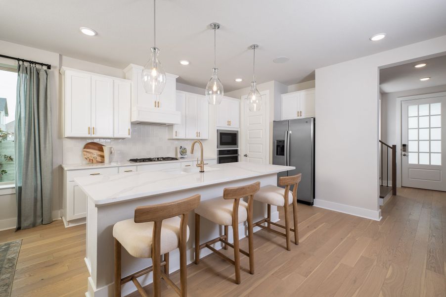 Representative furnished interior of a home built from the Sage by Tri Pointe Homes in The Retreat at Harvest, Argyle (Image 5).