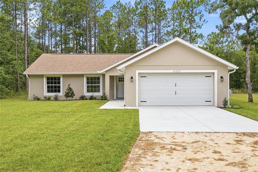 Front exterior of a new home in , Brooksville, FL, highlighting curb appeal (Image 24). Front exterior of a new home in , Brooksville, FL, highlighting curb appeal (Image 24).