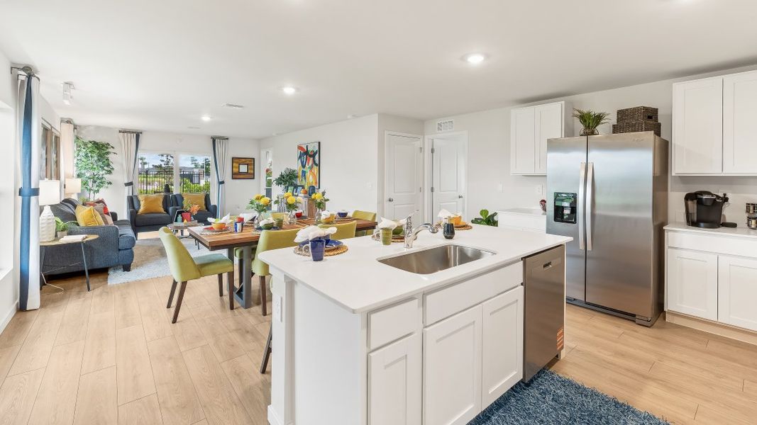 Furnished interior view inside a new home in Coral Bay - Express & Tradition, North Fort Myers (Image 7).